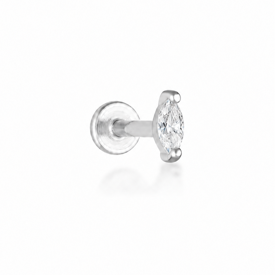 A single silver stud earring featuring a marquise-cut clear gemstone in a prong setting, shown on a clean white background with a soft reflection.